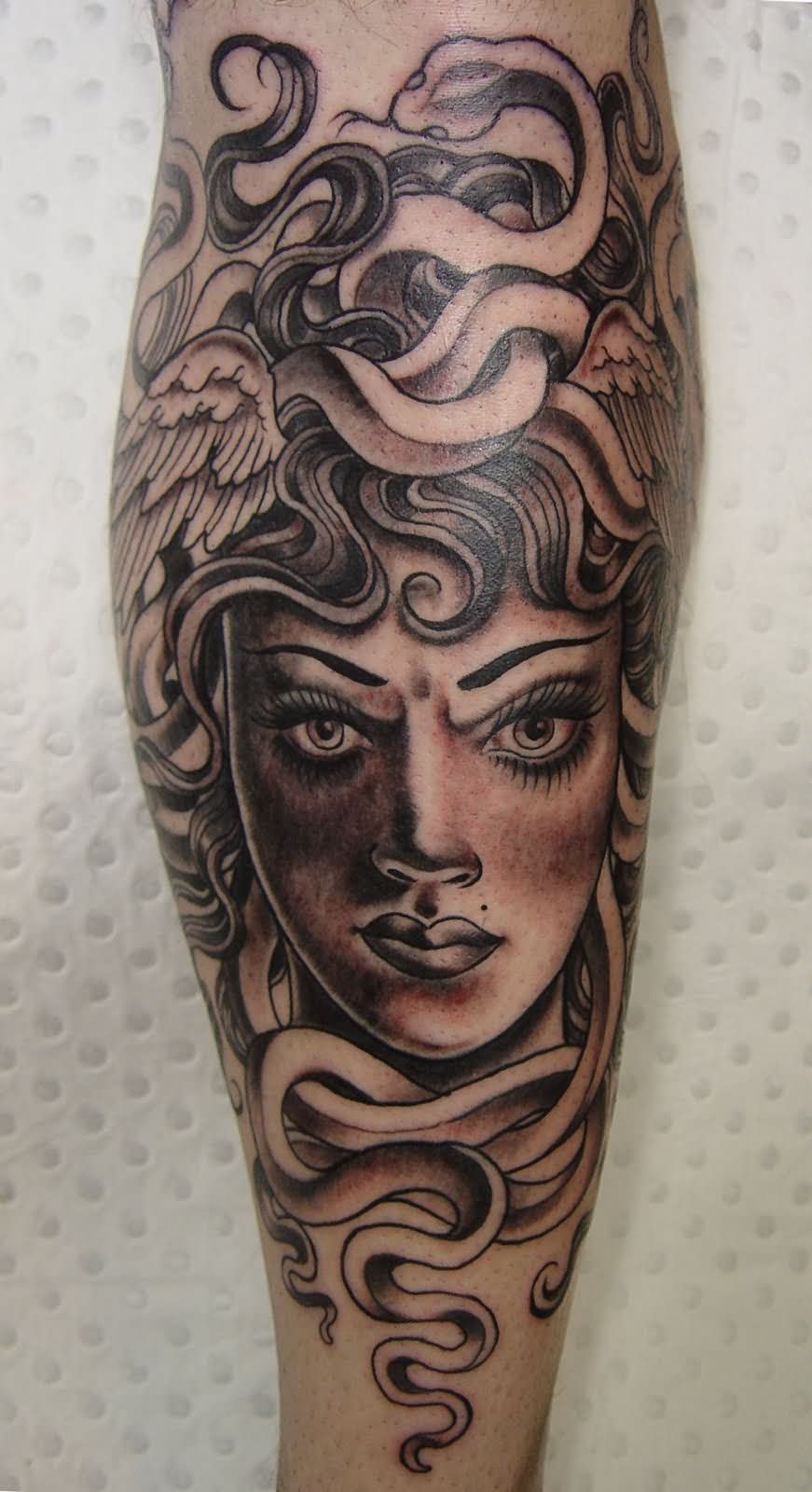 Grey And Black Medusa Face Tattoo
