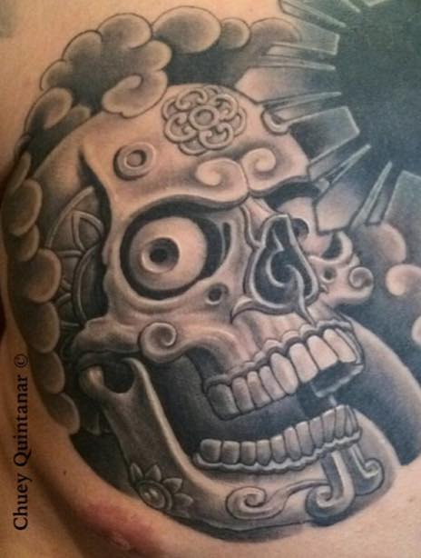 Grey Ink Aztec Skull Tattoo On Chest For Men