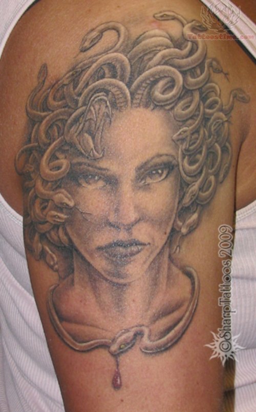 Grey Ink Medusa Face Tattoo On Right Shoulder