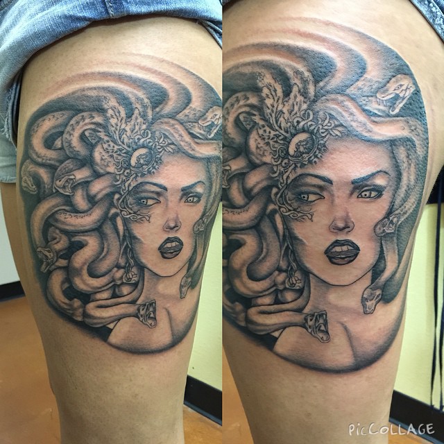Grey Ink Medusa Face Tattoo On Thigh by Gizmo