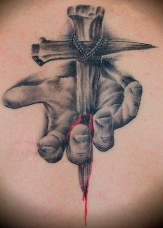 Nail cross piercing hand tattoo design