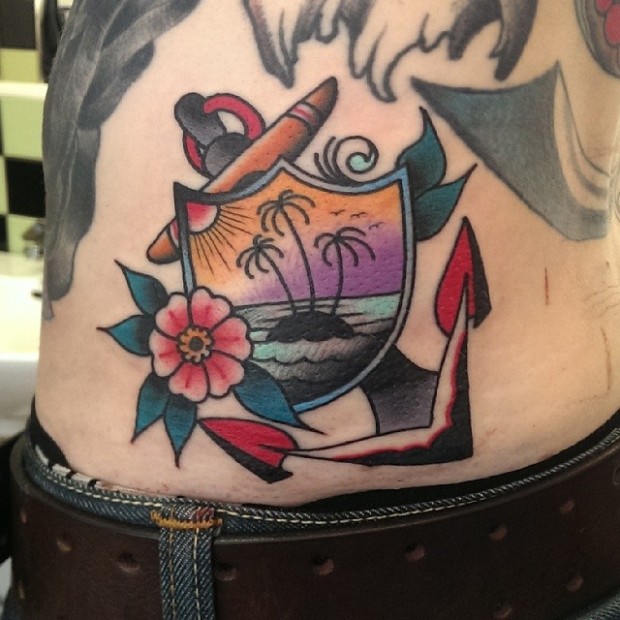 Nice Color Flower With Anchor Tattoo On Waist