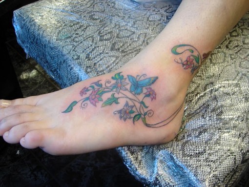 Nice Flowers And Butterfly Tattoo On Ankle