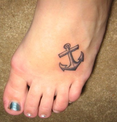 Nice Grey Anchor Tattoo On Left Foot For Girls