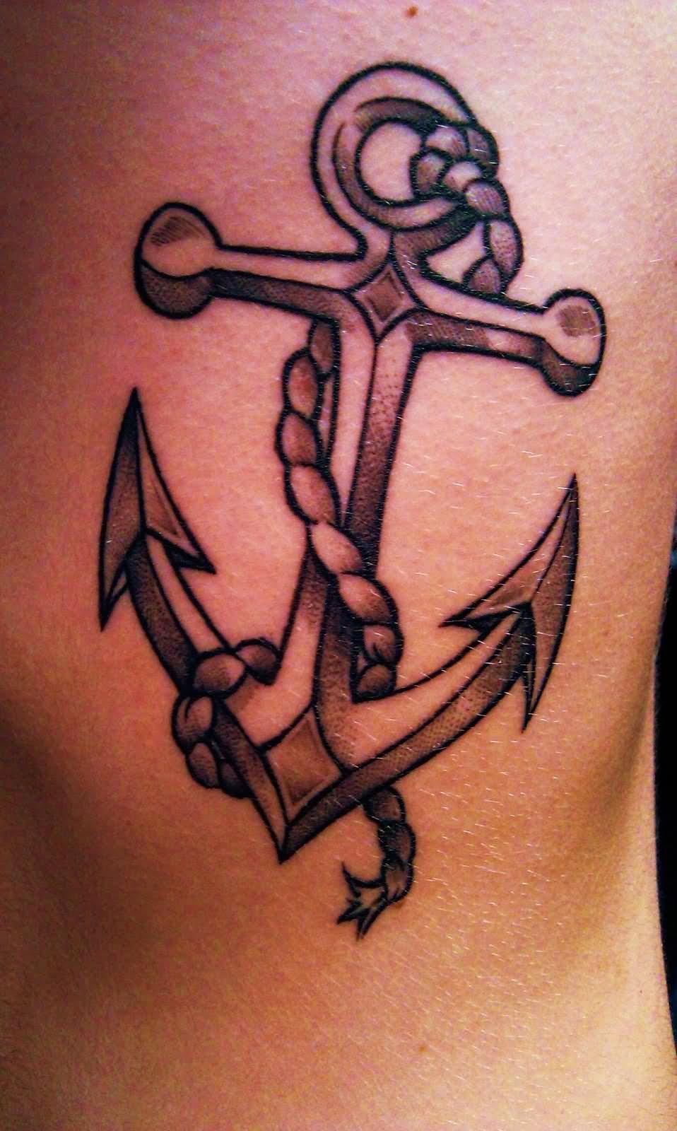 Nice Grey Ink Anchor Tattoo On Rib