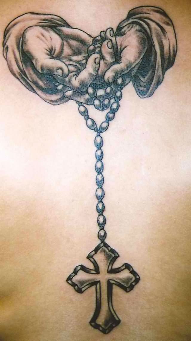 Open praying hands with rosary and cross tattoo by Slobula