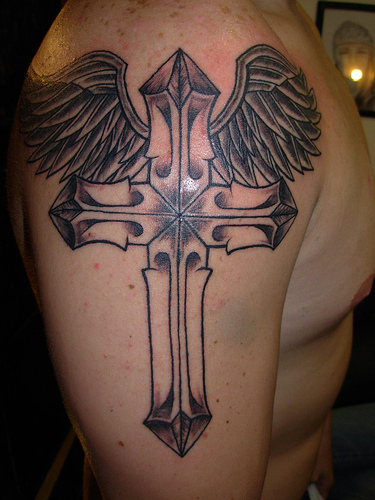 Open winged cross tattoo design for men shoulder