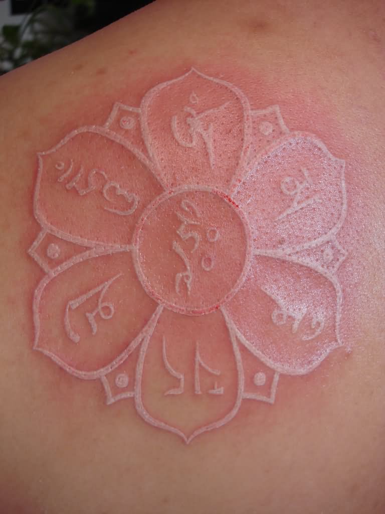 Sanskrit White Ink Tattoo On Left Back Shoulder