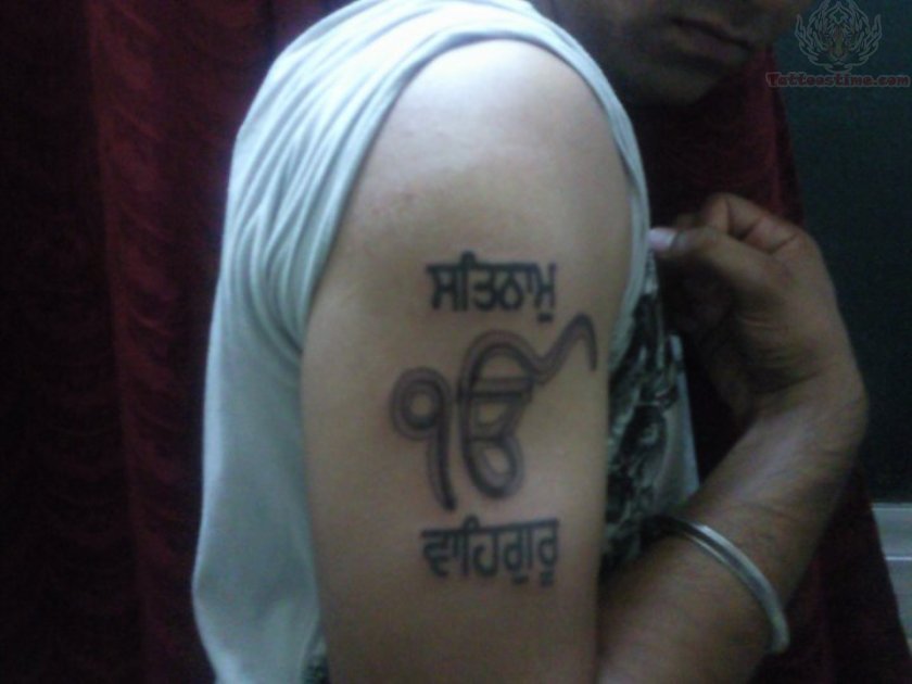 Satnam Waheguru - Black Ek Onkar Tattoo On Man Right Half Sleeve