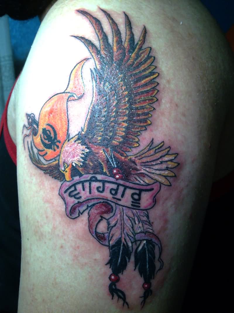 Sikhism Khanda Flag With Flying Eagle And Banner Tattoo On Man Left Shoulder