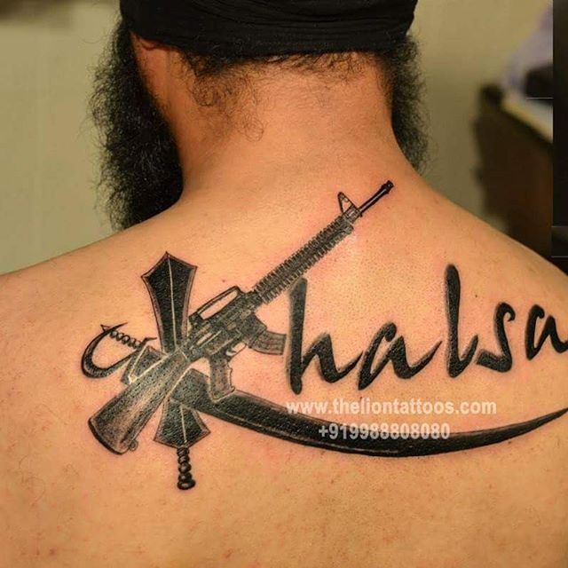 Sikhism Khanda With Sword And Gun Khalsa Tattoo On Man Upper Back