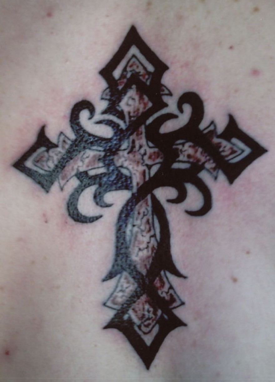 Small tribal cross tattoo