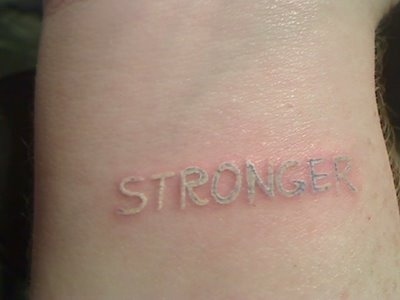 Stronger White Ink Word Tattoo