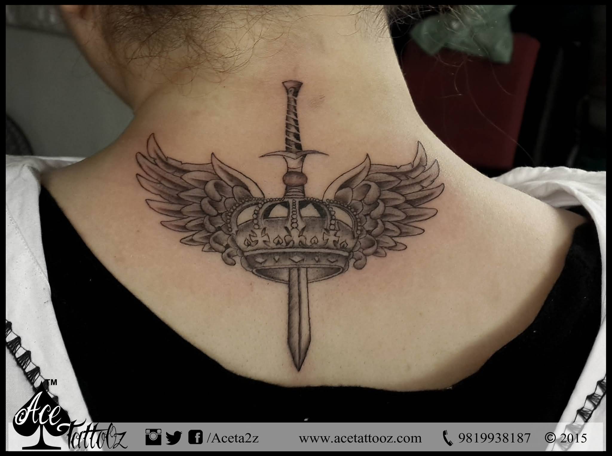Sword In Crown With Wings Tattoo On Upper Back