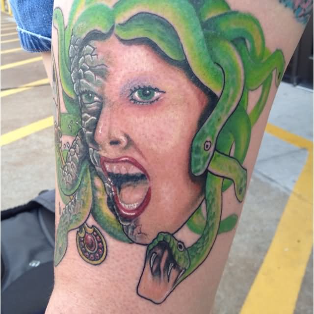 Unique Medusa Face Tattoo On Left Sleeve