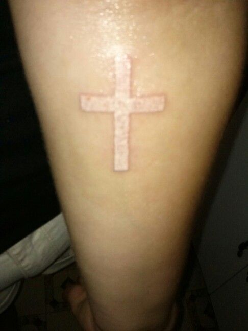 White Ink Cross Tattoo On Arm