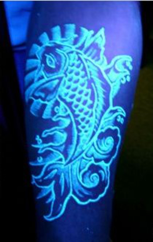 White Ink Koi Fish Tattoo Under Black Light