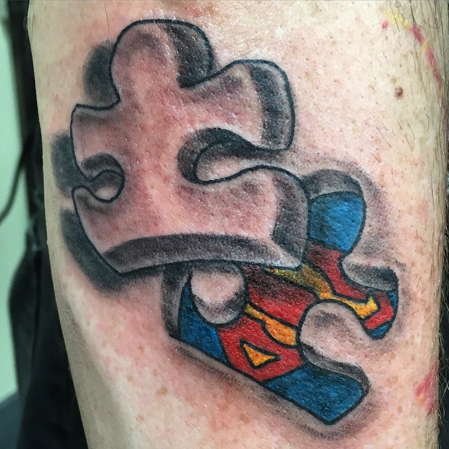 3D Superman Logo In Puzzle Tattoo Design For Arm