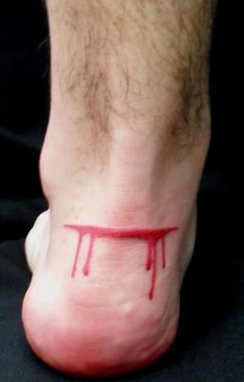 Achilles Cut And Bleeding Tattoo