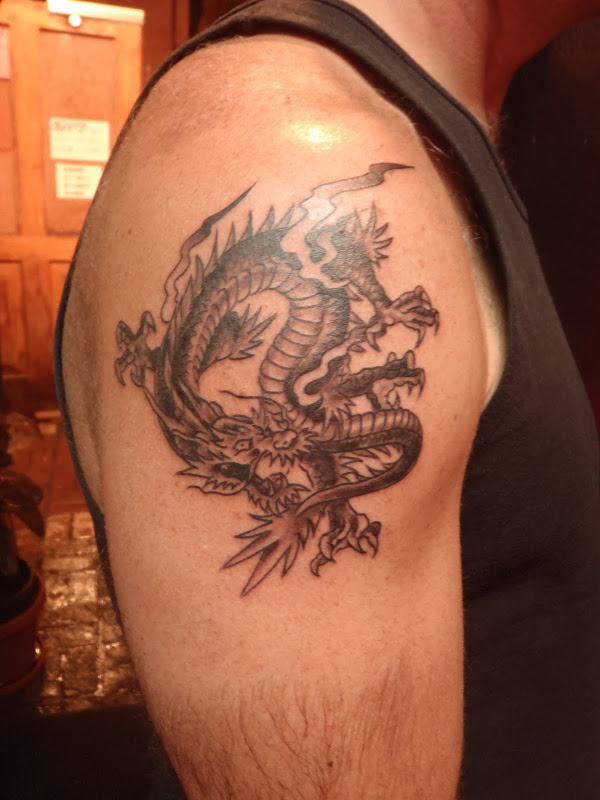Achilles Dragon Tattoo On Man Right Shoulder