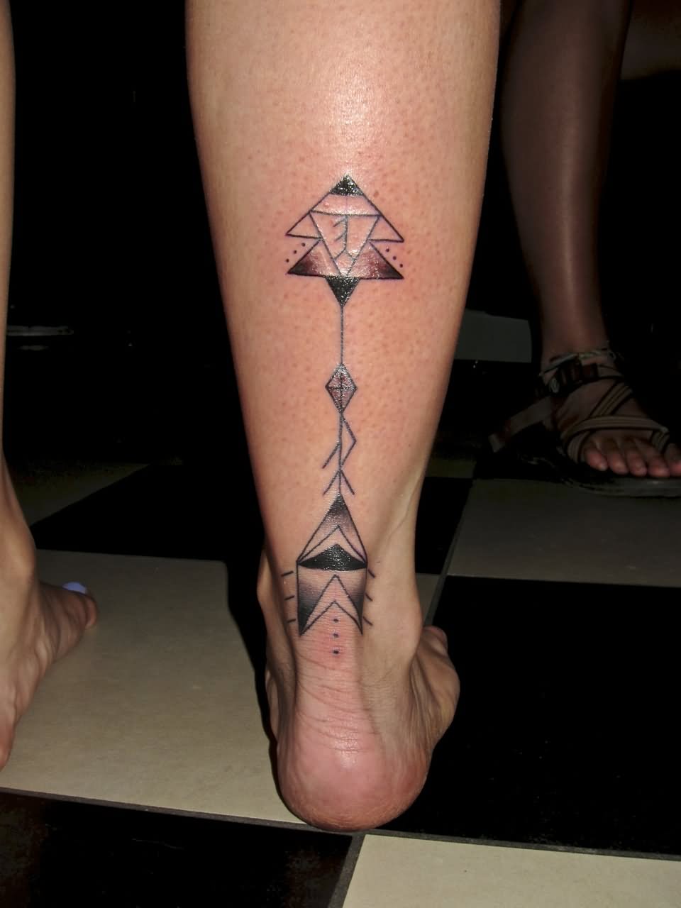 Amazing Geometric Arrow Tattoo On Achilles