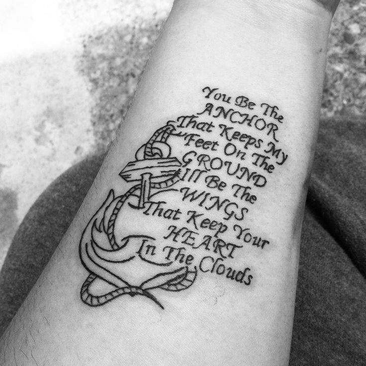 Anchor With Quote Tattoo On Left Forearm