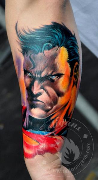 Awesome Colorful Superman Face Tattoo On Forearm