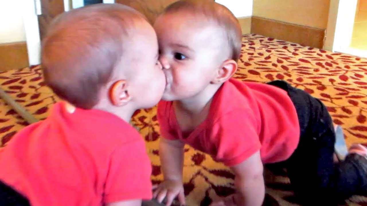 Baby Kissing In Mirror Funny Image