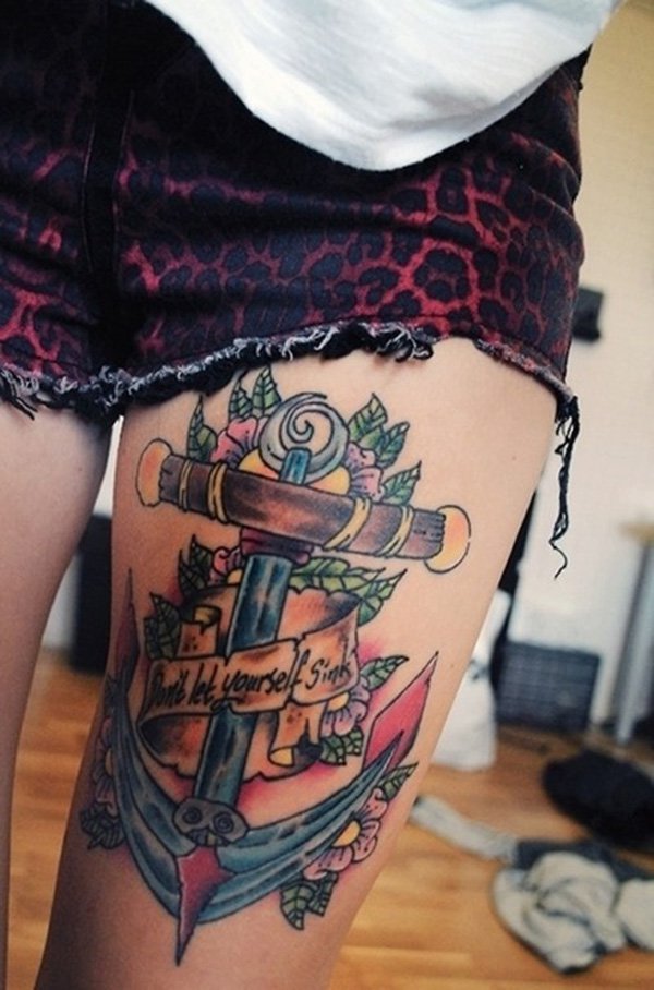 Banner And Color Anchor Tattoo On Left Thigh