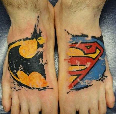 Batman Logo And Superman Logo Tattoo On Feet