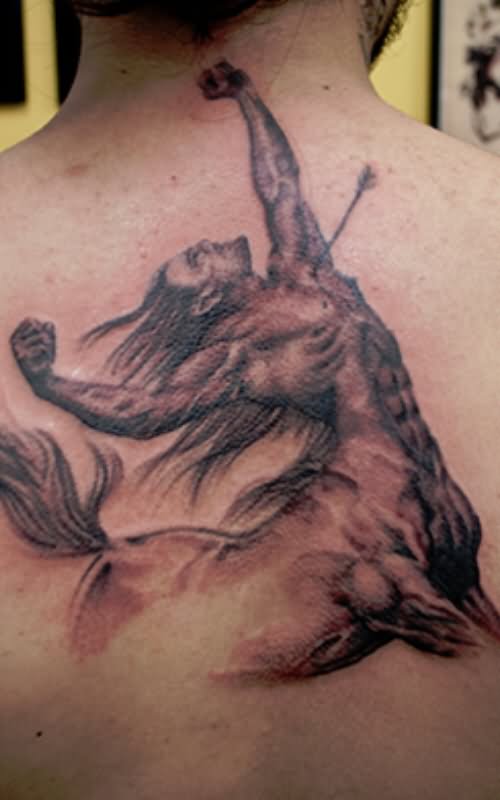 Black And Gery Achilles Sagittarius Tattoo On Man Upper Back