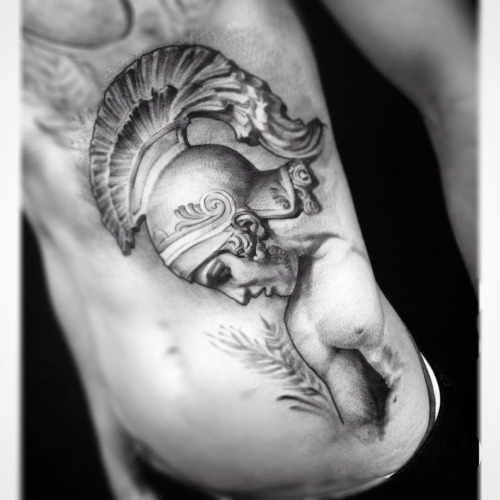 Black And Grey Achilles Warrior Tattoo On Man Side Rib
