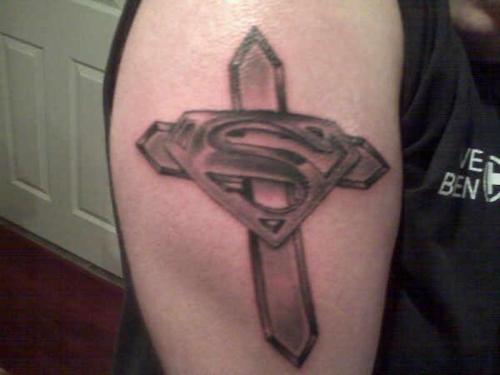 Black And Grey Superman Logo With Cross Tattoo Design For Shoulder