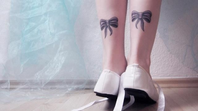 Black And Grey Two Bows Tattoo On Girl Both Achilles