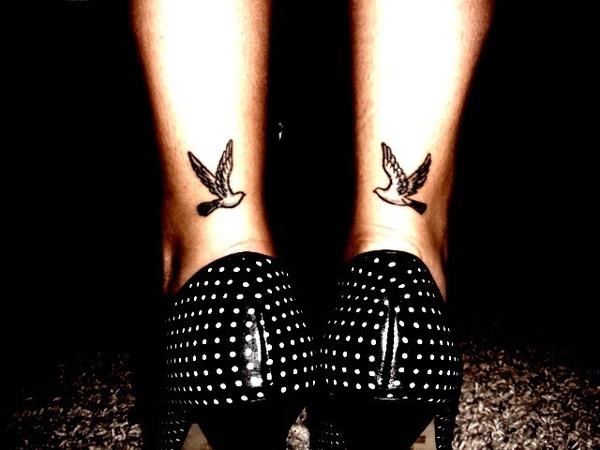 Black Flying Bird Tattoo On Girl Both Achilles
