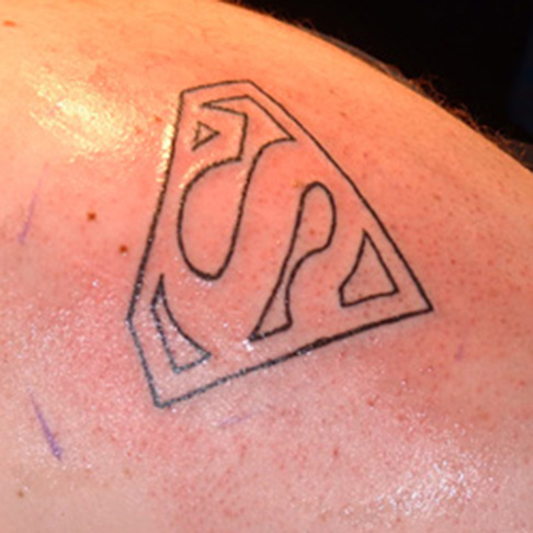 Black Outline Superman Logo Tattoo Design
