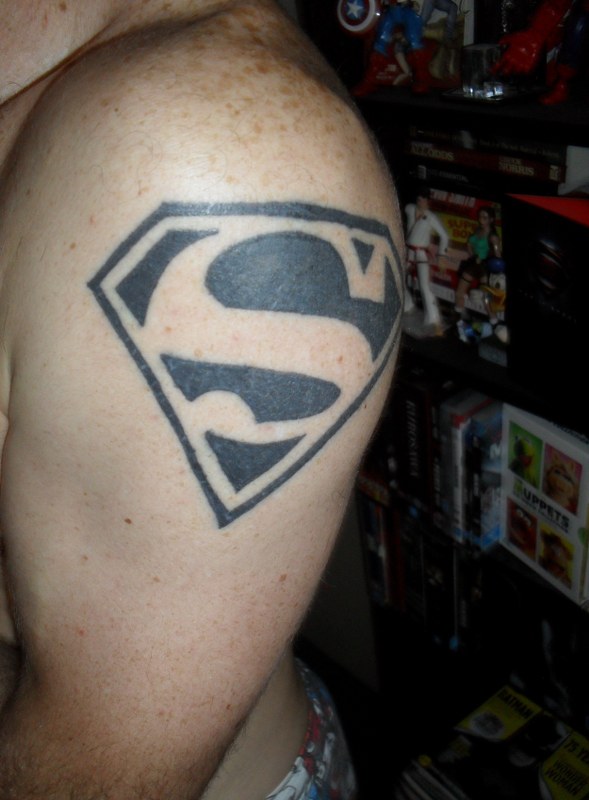 Black Superman Logo Tattoo On Left Shoulder
