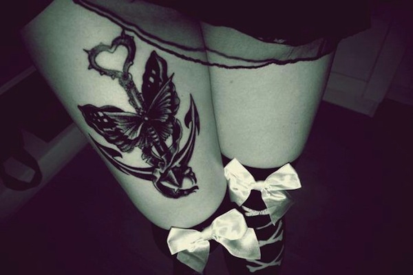 Butterfly And Anchor Tattoo On Right Thigh