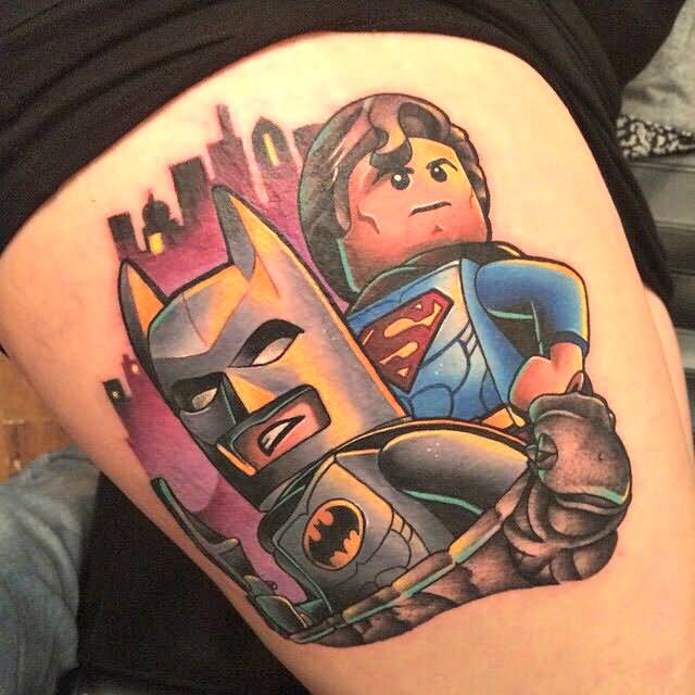 Cartoon Batman And Superman Baby Tattoo Design