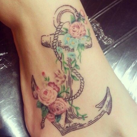 Color Flowers And Rope Anchor Tattoo On Foot