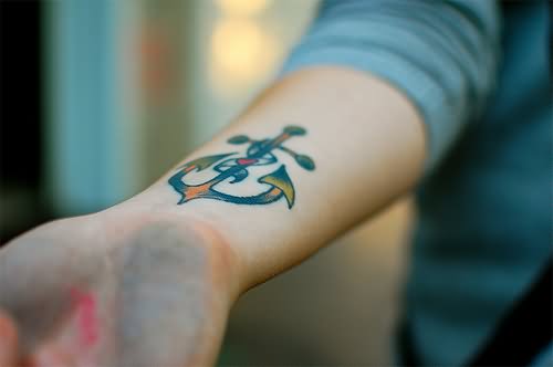 Colorful Anchor Tattoo On Right Forearm