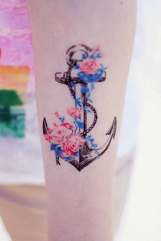 Colorful Flowers And Anchor Tattoo On Arm