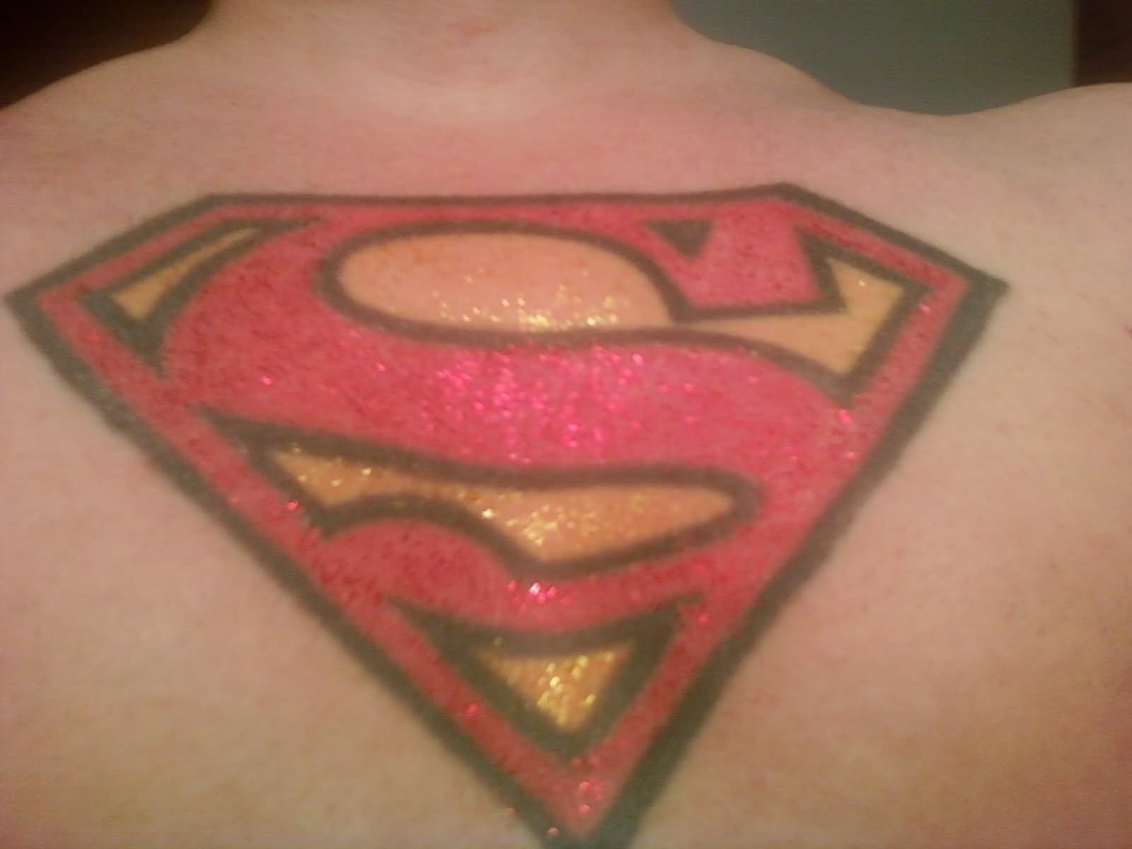 Colorful Superman Logo Tattoo Design For Upper Back
