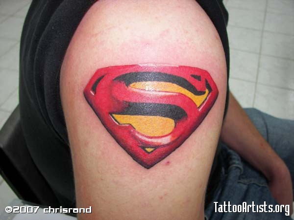 Colorful Superman Logo Tattoo On Left Shoulder