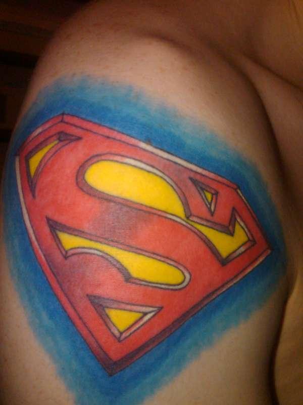 Colorful Superman Logo Tattoo On Right Shoulder