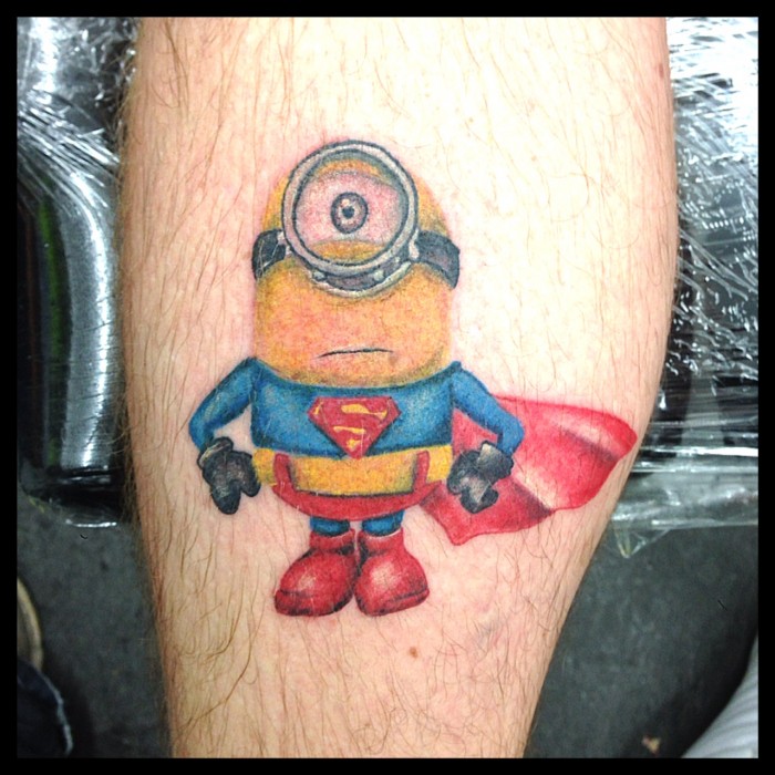Colorful Superman Minion Tattoo Design For Leg