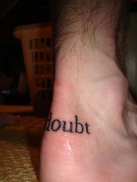 Doubt Lettering Tattoo On Achilles