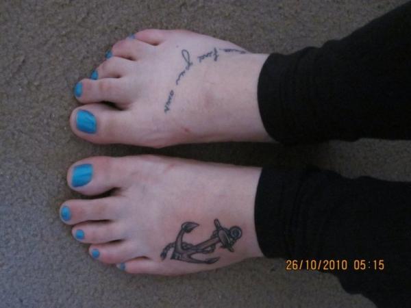 Grey Anchor Tattoo On Girl Left Foot