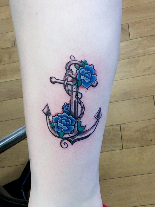 Grey Anchor With Blue Rose Flowers Tattoo On Leg