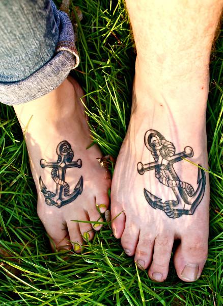 Grey Ink Rope And Anchor Tattoos On Feet